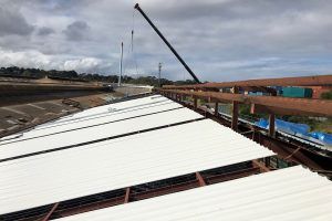 Commercial metal reroofing project by Lidoran